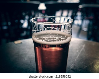 Vintage Looking Pint Of English Bitter Ale In A Pub
