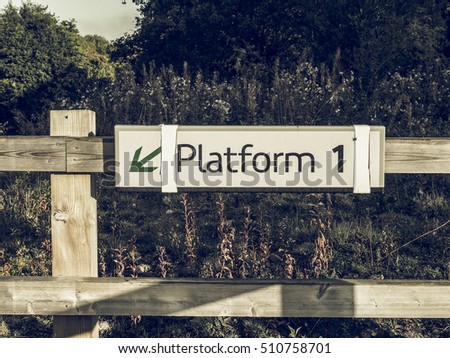 Vintage looking Platform 1 sign at railway station