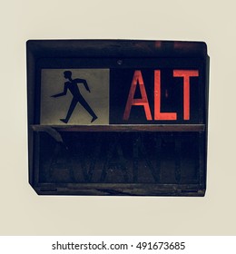 Vintage looking Traffic light for pedestrian crossing showing Alt sign in red meaning Stop
