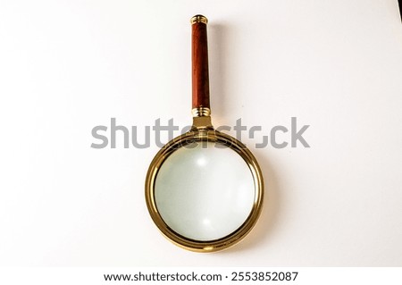 Vintage Magnify Glass Loupe on a White Background