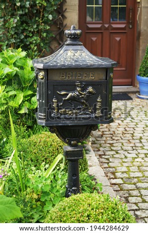 Vintage mailbox in the courtyard of a village house