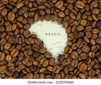 Vintage map of Brazil covered by a background of roasted coffee beans. This nation is the first main producer and exporter of coffee. Horizontal image