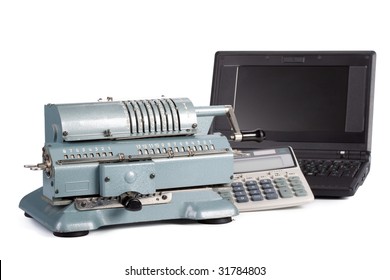 Vintage mechanical adding machine, modern calculator and notebook on a white background