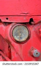 Vintage mechanical combustion engine farm tractor headlight.