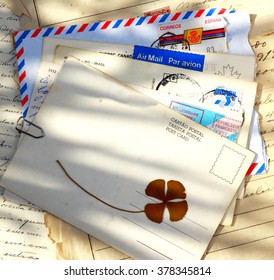 Vintage Memories   Vintage air mail envelopes and blank card with pressed 4 â?? leaf clover.