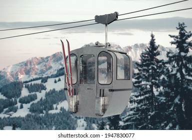 Vintage metal gondala with retro ski in  front of winter landscape