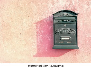 Vintage Metal Mail Box On Terracotta Wall