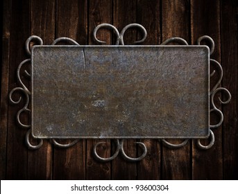 Vintage Metal Plate  On Old Oak Door