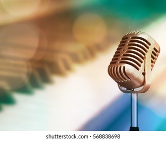 Vintage Micro Phone With Blurred Piano Keyboard And Bight Light Background, Soft Focus