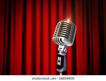 Vintage Microphone Over Red Curtains