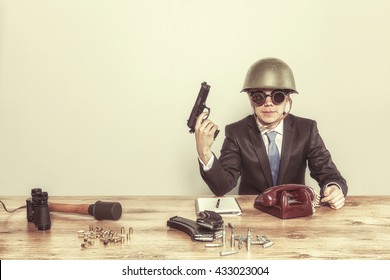 Vintage Military Businessman Sitting At Office Desk With Hand Gun