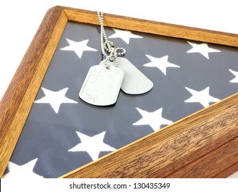 Vintage Military Dog Tags On Wooden Flag Display Case And American Flag