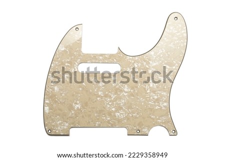 Vintage mother of pearl pickguard for electric guitar on white background
