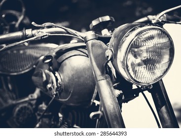 Vintage Motorbike, Focus On A Headlamp. Retro Motorcycle With Headlight On Black And White Colors.