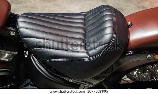 Vintage\
motorcycle cushion.\
Leather motorcycle\
seat.