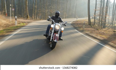 Vintage Motorcycle Driving on country road