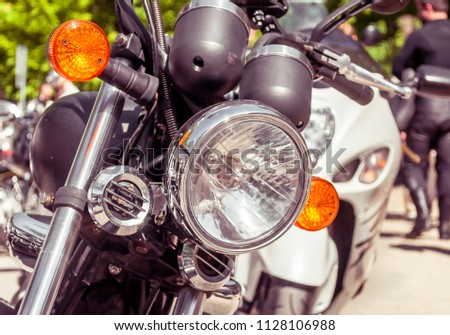 Similar – Motorcycle headlights with senior man steering