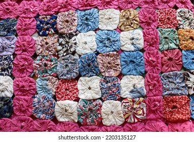 Vintage, Multicolored Yo-yo Quilt, With Rows Of Small Yo-yo Circles Made Of Scraps Of Fabric Carefully Sewn Together.  Quilt Was Made In A Quilting Circle During The Depression In North Carolina.