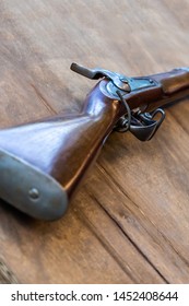 vintage musket with a wooden butt closeup lying on the table - Shutterstock ID 1452408644
