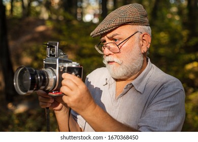 Vintage Is My Style. Old Photographer Look In Vintage Camera Outdoors. Bearded Pensioner Take Travel Photos. Vintage Style. Vintage And Retro. When Life Gets Blurry Adjust Your Focus.