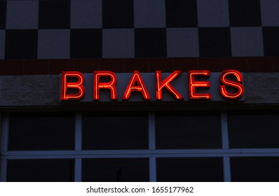 Vintage Neon Brakes Sign On Car Repair Shop