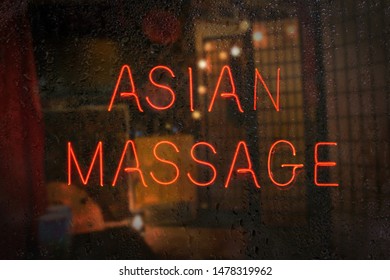 Vintage Neon Sign in Window Asian Massage