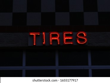 Vintage Neon Tires Sign On Car Repair Shop