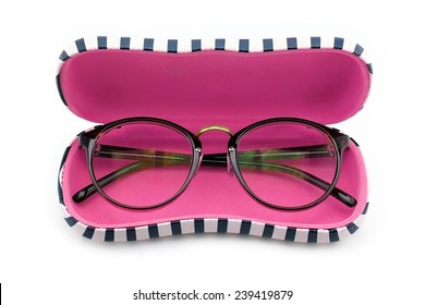 Vintage nerd glasses in the leather case over white, clipping path, Classic eyeglasses.