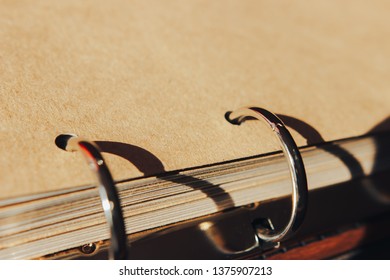 Vintage notebook with Ring Book Mechanisms, rustic wooden style. album on the mechanism of metal rings - Shutterstock ID 1375907213