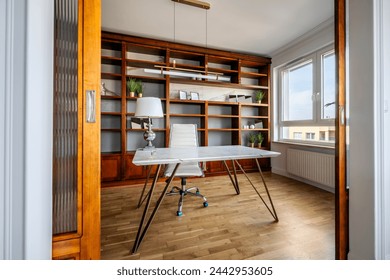 Vintage office library interior design with marble desk and stylish lamp - Powered by Shutterstock