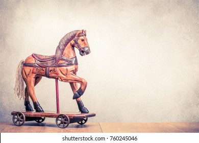 vintage wooden horse on wheels