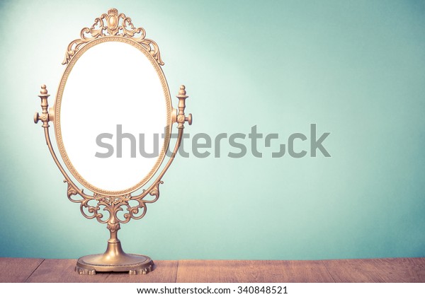 Vintage old desk mirror frame. Retro style filtered photo