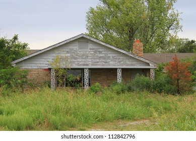 Vintage Old House Overgrown With Grass