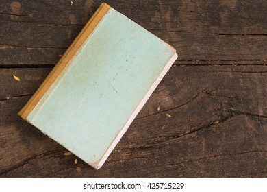 Vintage Old Note Book On A Wood Table