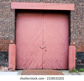 Vintage Old Red Brick Carriage Garage Wall Door Street In Manhattan New York