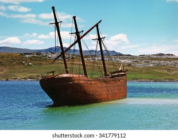 Vintage old ship in lagoon, Falkland islands