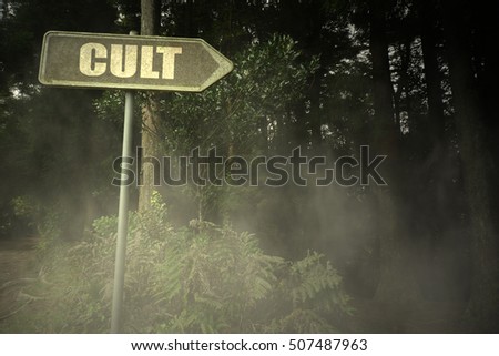 vintage old signboard with text cult near the sinister forest