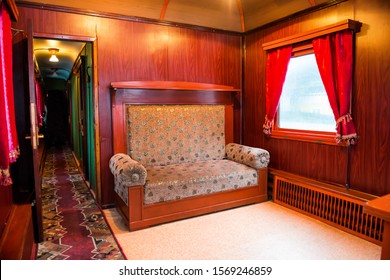 Vintage Old Sofa In The Compartment Interior. Old Luxury Wagon In A Train