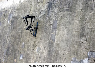 Vintage Old Street Classic Iron Lantern On The House Wall, Close Up. Streetlight Broken