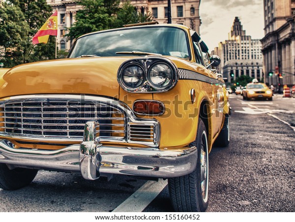 Vintage old Taxi in New York City. Classic\
Yellow Cab in\
Manhattan.