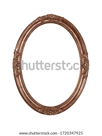 Vintage old wooden classic bronze round oval frame for picture or photo, isolated on white background, close up