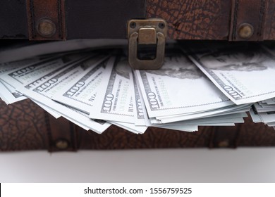 vintage open chest with lots of money dollar bills. Concept of wealth and abundance. - Shutterstock ID 1556759525