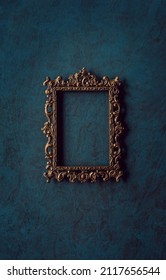 Vintage openwork bronze metal frame on a old wall background - Shutterstock ID 2117656544