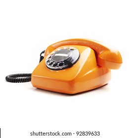 Vintage Orange Telephone Isolated Over White Background