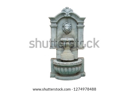 Vintage outdoor concrete wall fountain isolated on white background.