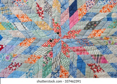 Vintage patchwork quilt, diamond pieces, fabric scraps