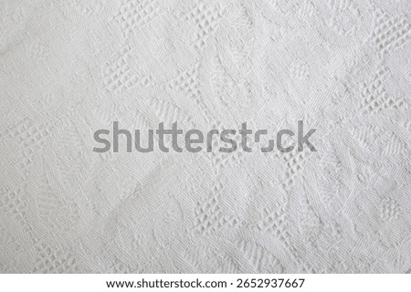 Vintage patterned table cloth , white fabric folds abstract  backdrop