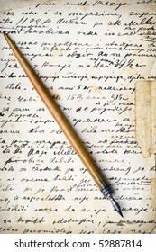 a vintage pen on a handwritten grunge paper