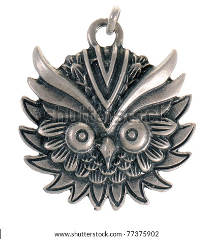 Vintage pendant shaped like an owl isolated on white background