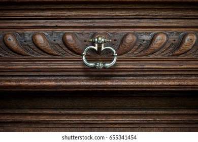 Vintage Pewter Silver Metal Handle Or Knocker On Dark Rich Mahogany Wood Dresser Door. 